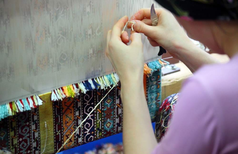 Traditional Carpet Weaving by a Woman in Van